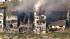 A four-alarm fire damaged three beachfront homes...