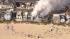 A four-alarm fire damaged three beachfront homes...