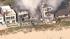 A four-alarm fire destroyed one beachfront home...
