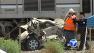 Good Samaritans rescued an elderly man whose car ended up on the path of an oncoming train in Fullerton on Tuesday.