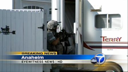 Two O.C. schools were put on lockdown as Anaheim Police searched a neighborhood for suspects in a violent home invasion.