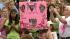 A participant holds up a sign at the Susan G....
