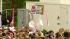 A participant holds up a sign at the Susan G....