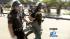 Police arrest a man during a protest in Anaheim...