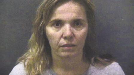 Kathia Davis, 45, is shown in this booking photo.
