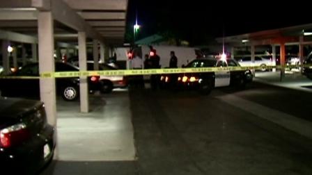 Authorities investigate at an apartment complex in La Palma, where a mans body was found inside a car on Wednesday, Oct. 24, 2012.