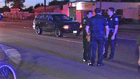 Santa Ana police investigate the scene of a hit-and-run crash that injured three teenagers in Santa Ana on Friday, Nov. 9, 2012.