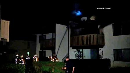 Firefighters battle a fire at a Tustin apartment complex on Tuesday, Nov. 20, 2012.