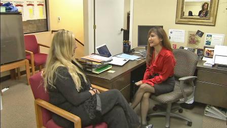 Lorri Galloway (right), executive director of the Eli Home is seen talking with former resident Danielle Moser (left) in this undated file photo.