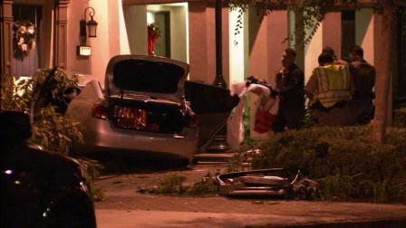 A brief pursuit ended with a car crashing into a townhouse in Stanton on Wednesday, Jan. 23, 2013.