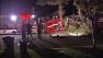 Investigators at the scene of a crash involving a fire truck in Buena Park on Wednesday, March 14, 2013.