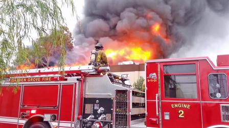 Firefighters battle a fire that damaged two businesses on the 11000 block of Western Avenue in Garden Grove on Saturday, April 13, 2013.