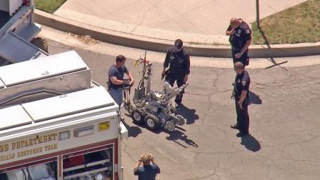 A robot was brought to aid an investigation into three suspicious devices found at a Del Taco in Fullerton on Friday, April 19, 2013.