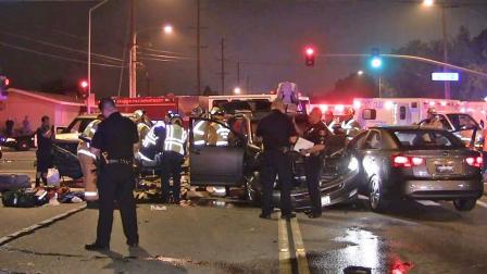Law enforcement officials investigate the scene of a crash involving an allegedly drunk driver at Gilbert Street and La Palma Avenue in Anaheim on Sunday, May 12, 2013.