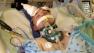 This photo provided by family members of Viktor Silcock shows him fighting for his life after being beaten near Murdy park in Huntington Beach on Friday, May 10, 2013.