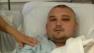 Vicktor Silcock, 25, seen in a hospital bed in this undated photo, was nearly beaten to death with skateboards when he tried to break up a fight between two groups of teens at a park in Huntington Beach on Friday, May 10, 2013, police said.