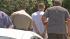 John Kudla, 17, is shown in handcuffs following his arrest Wednesday, May 22, 2013. He is accused of beating his father, 50-year-old Jon Kudla, with a hammer.
