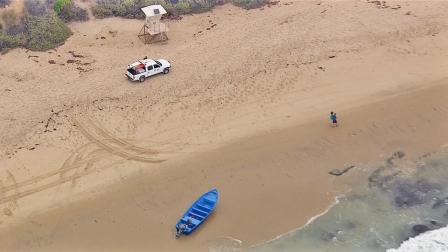 Twenty-four people were arrested when a panga boat was spotted near Crystal Cove State Park in Orange County Thursday morning, June 13, 2013.