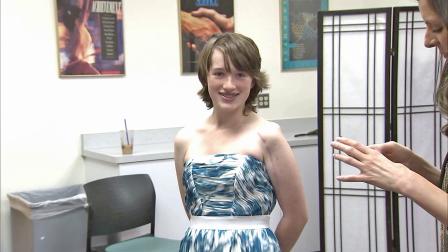 Samantha Bower poses as she tries on a prom dress at Childrens Hospital of Orange County on Saturday, June 15, 2013.