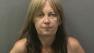 Rebecca McLaughlin, 48, was arrested on suspicion of intentionally hitting an Orange County sheriffs special officer on bike patrol at John Wayne Airport on Tuesday, July 16, 2013.