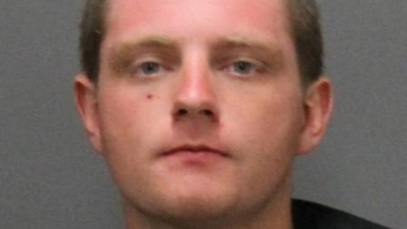 Kyle Alan Veach, 24, was arrested on suspicion of robbing a Laguna Beach bank on Wednesday, July 17, 2013.