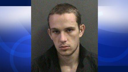 Tyler Tennigkeit, 22, is shown in a booking photo provided by the Orange County Sheriffs Department.