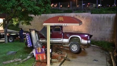 A pickup truck is seen after it crashed into the drive-thru of the McDonalds restaurant on the 22300 block of Old Canal Road in Yorba Linda on Saturday, Aug. 24, 2013.