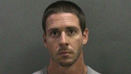 Max Edward Fernandez, 27, is seen in this booking photo provided by the Orange County Sheriffs Department.