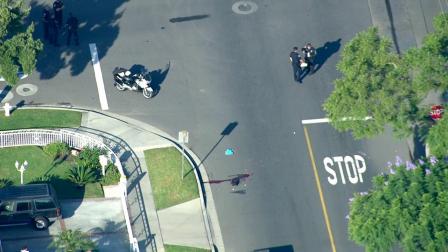 Police respond to the area near Ramona Drive and Central Avenue in Santa Ana where a 6-year-old child was struck and killed by a vehicle Monday, Oct. 14, 2013. His grandmother was also injured in the crash.