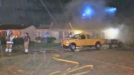 A dog may have saved a sleeping Santa Ana family from a house fire Tuesday morning, October 29, 2013.