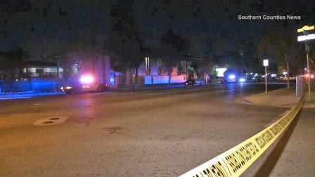 An investigation is underway after a woman and a child were found badly injured on the intersection of Edinger Avenue and Raitt Street in Santa Ana on Thursday, Oct. 31, 2013. The woman later died.