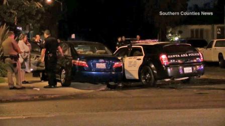 Authorities respond to the scene of a crash on Broadway Street and 18th Street in Santa Ana Saturday, Nov. 16, 2013.