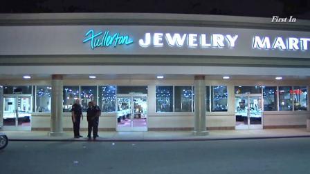 Police investigate an attempted robbery at the Fullerton Jewelry Mart on Wednesday, Nov. 20, 2013.