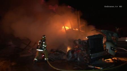 A big rig carrying mail went up in flames on Tuesday, Mar. 4, 2014 on the 57 Freeway in Brea.