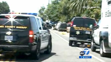 Ventura County officials investigate a crime scene in Santa Paula on Sunday, June 17, 2012.