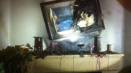 A fire tore through a structure on the 9600 block of Tule Lake Street in Ventura on Wednesday Nov. 28, 2012. Firefighters say unattended candles left on a fireplace mantel are to blame.
