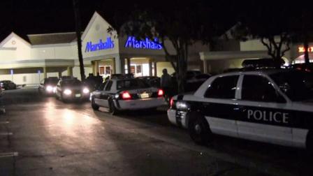 Police patrol cars line up outside a Marshalls in Oxnard on Ventura Boulevard after a woman was attacked in an attempted carjacking on Thursday, Dec. 20, 2012.