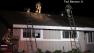 Firefighters are seen battling a fire on Mariposa Drive in Santa Paula on Wednesday, Jan. 2, 2013.