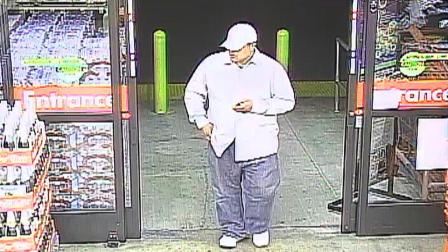 An armed robbery suspect was described as a clean-shaven Hispanic male about 35 years old, standing about 5 feet 11 inches tall, weighing about 275 pounds.