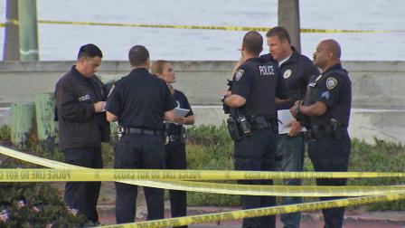 Authorities investigate after a man was shot and killed by Port Hueneme police on Friday, Sept. 6, 2013.