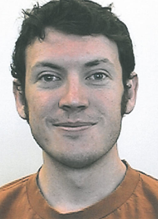 James Holmes, 24, of North Aurora, is shown in...