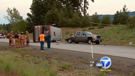 A bus carrying soccer fans slammed into a pickup truck on the shoulder of Interstate 90 in central Washington, setting off a three-vehicle crash that killed two people and injured up to 15 others on Saturday, May 28, 2011.