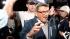 Students greet Penn State football coach Joe...