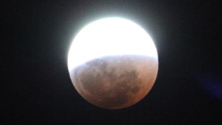 A lunar eclipse in progress in Harare, Zimbabwe Wednesday, June, 15, 2011.