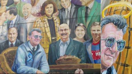Artist Michael Pilato painted over a halo he placed over Penn State football coach Joe Paternos head in a mural. He added a blue ribbon to the coachs jacket, symbolizing support for child-abuse victims.