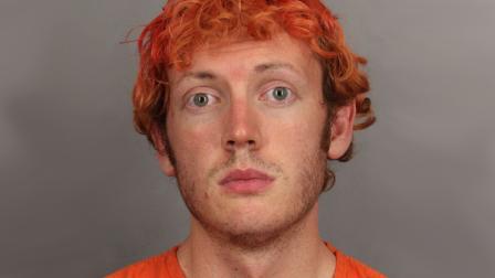 James Holmes, accused in the mass shooting in a movie theater in Aurora, Colo., is seen in a booking photo provided by police.