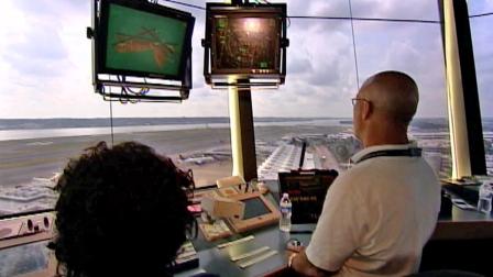 Air traffic controllers appear in this undated file photo.