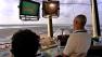 Air traffic controllers appear in this undated file photo.