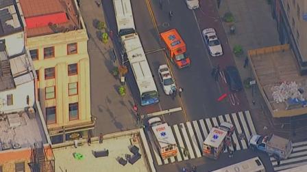 Emergency vehicles respond to the scene of a shooting outside the Empire State Building on Friday, Aug. 24, 2012.