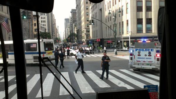 Emergency vehicles respond to the scene of a shooting outside the Empire State Building on Friday, Aug. 24, 2012.
